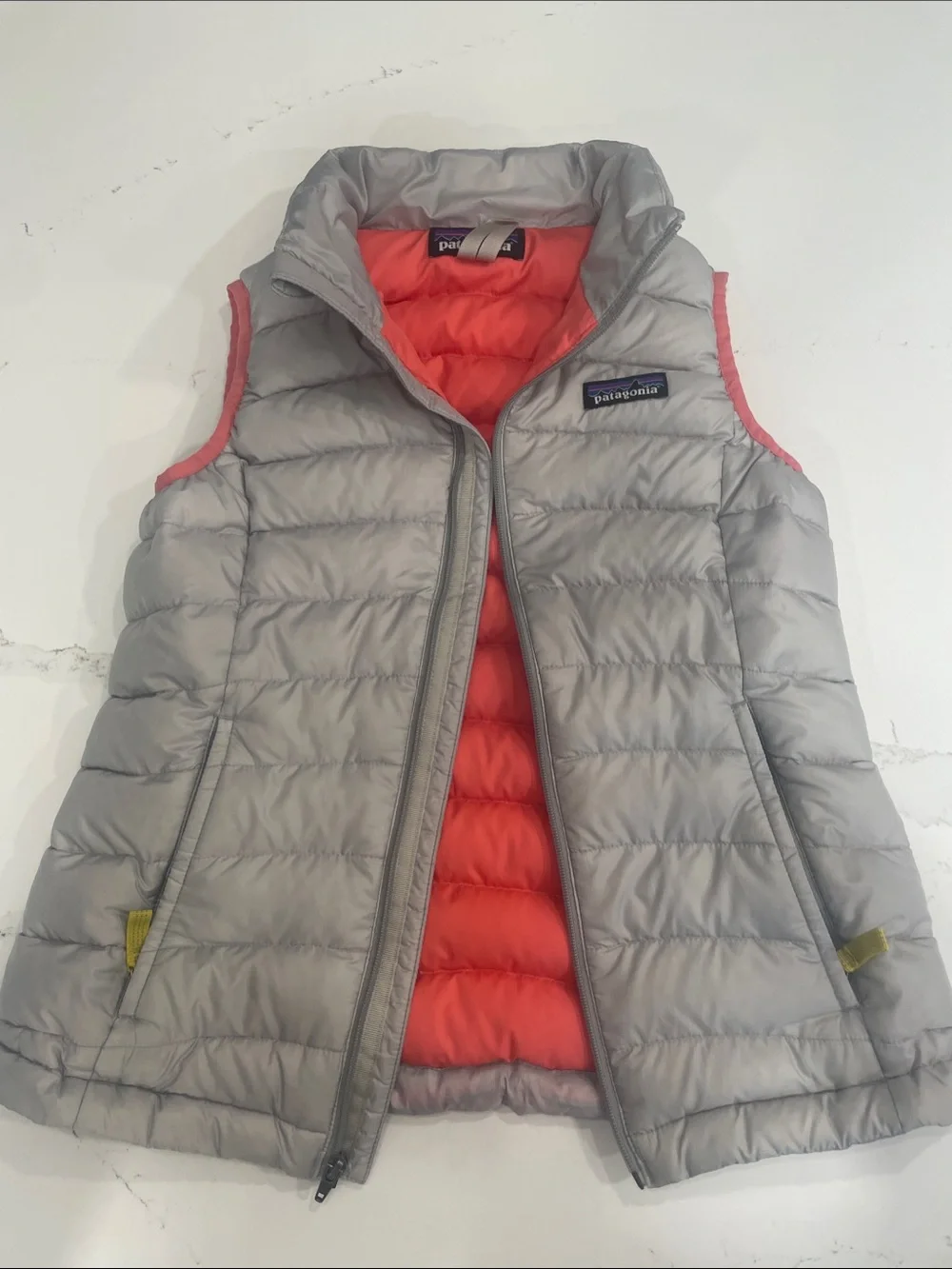Patagonia Kids Puffer Vest in Light Gray with Coral Interior